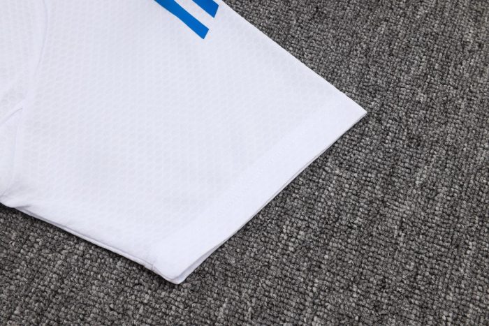 Real Madrid White Polo Shirt with Blue Trim - 图片 5