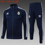 Real Madrid 24/25 Long Zip Jacket in Royal Blue with White Trim
